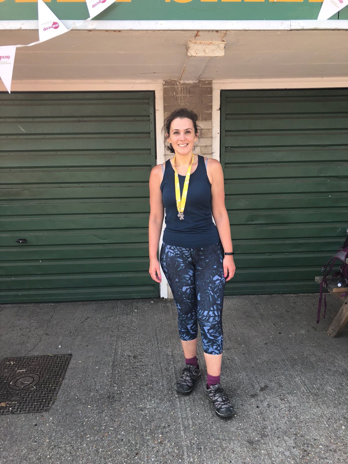 Demetra is the first person to cross the finish line!